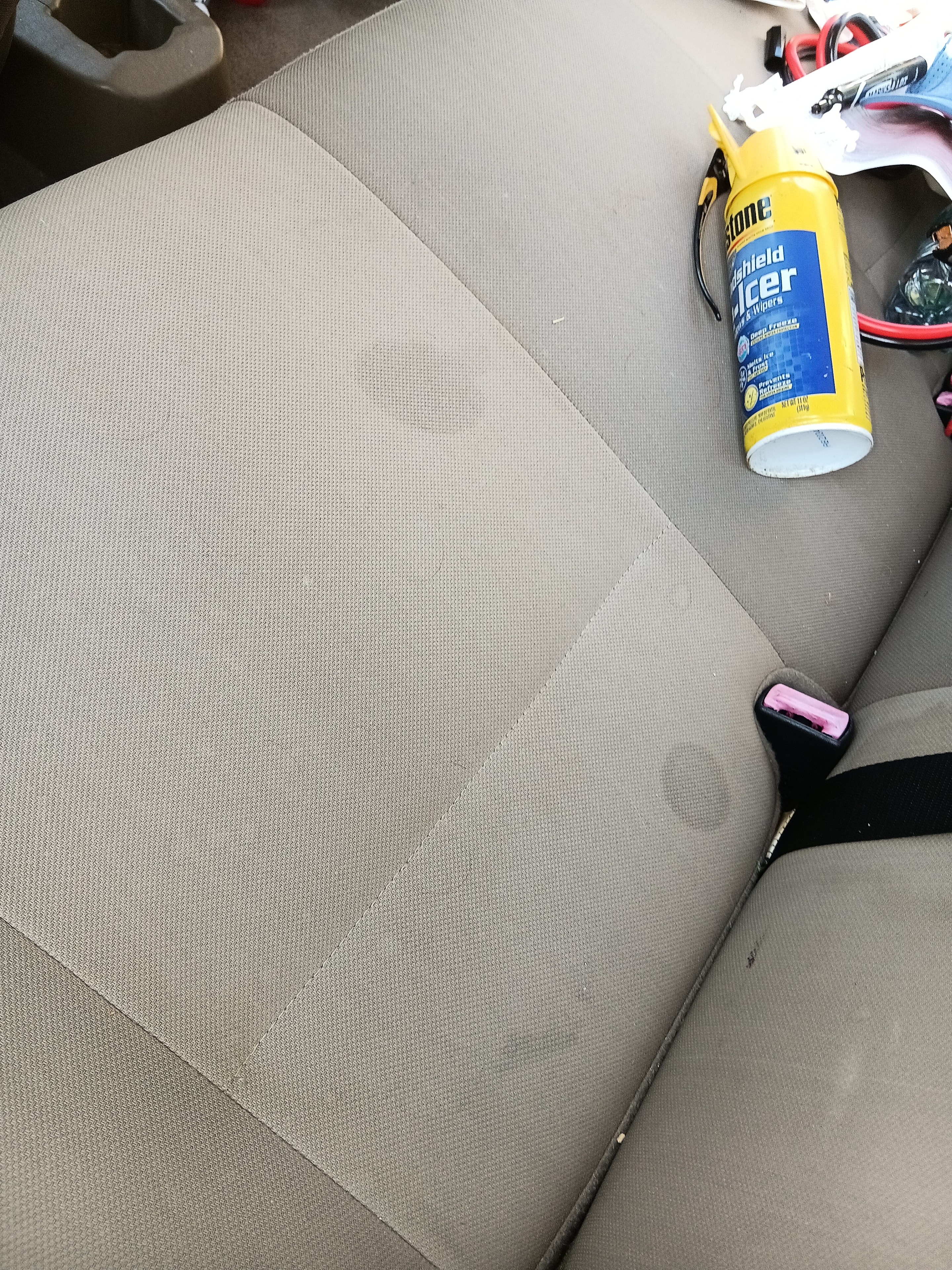 Tan Ford Focus center console before interior detailing