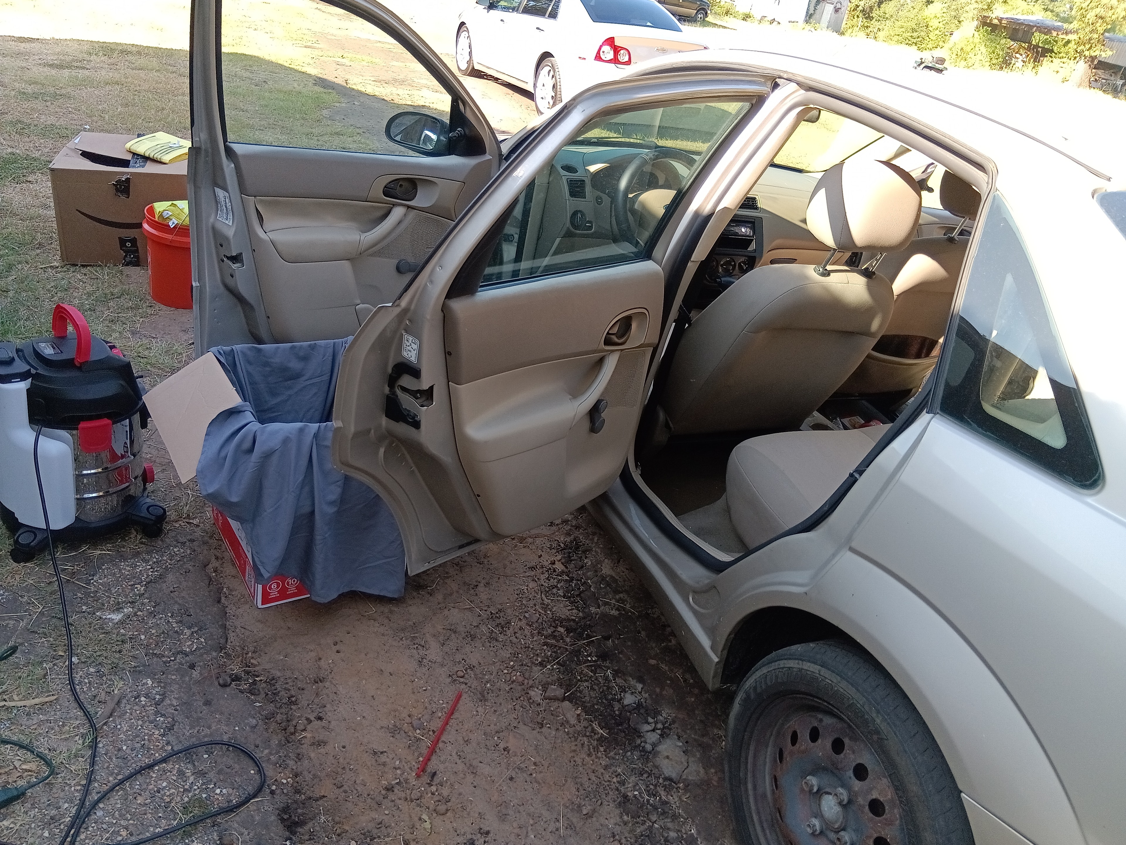 Tan Ford Focus front cabin before interior detailing