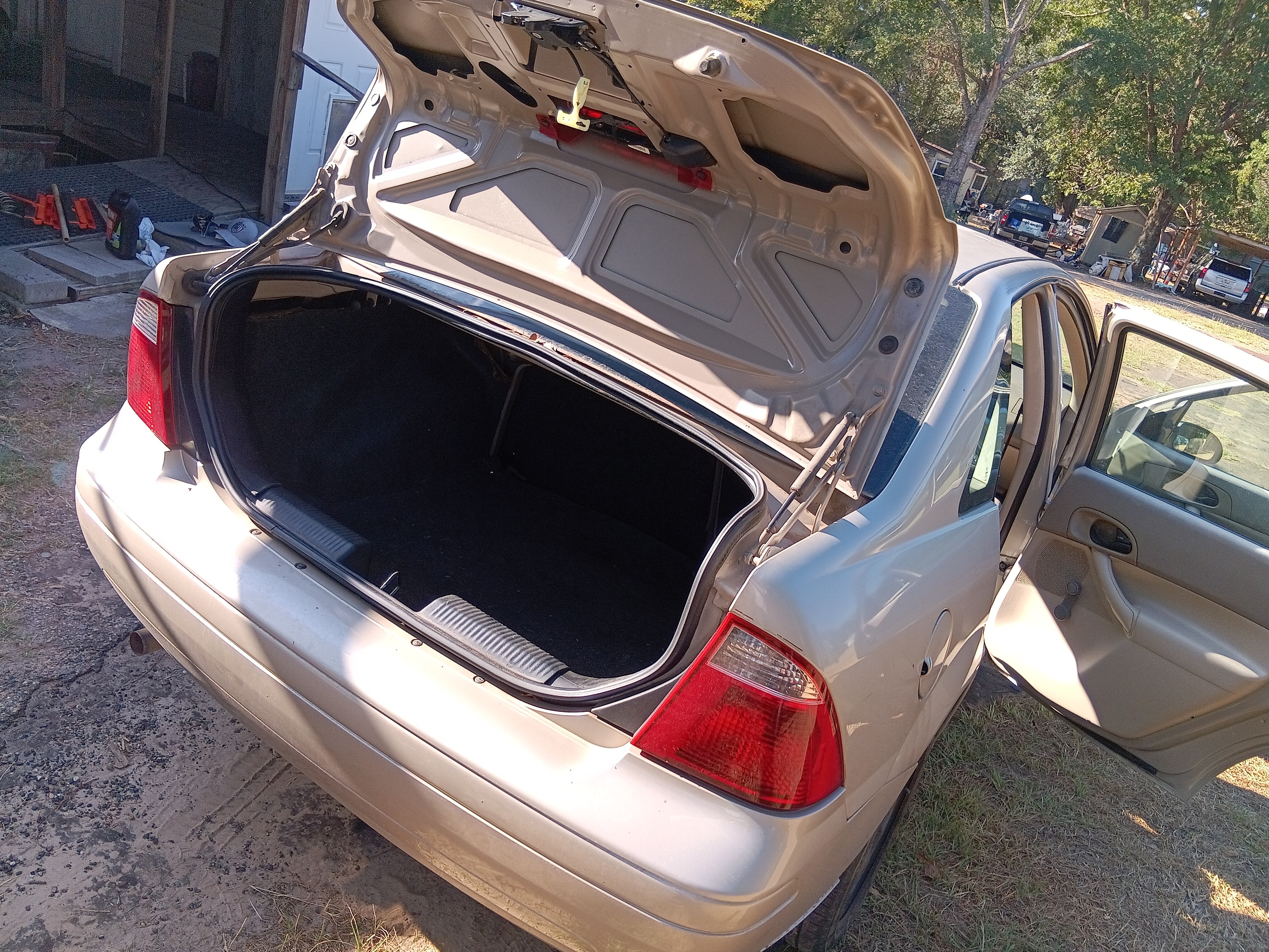 Tan Ford Focus rear-seat area after interior detailing
